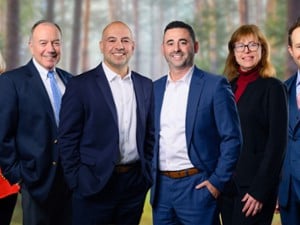 the team at Herzog Law Firm, P.C.