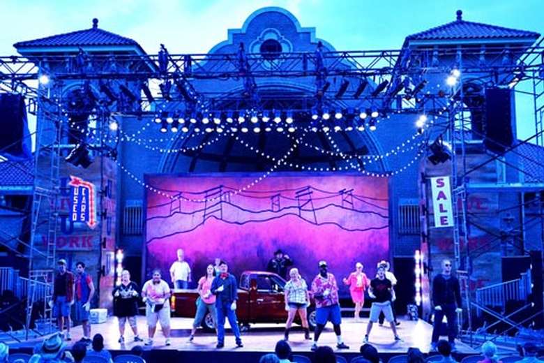 cast on outdoor stage