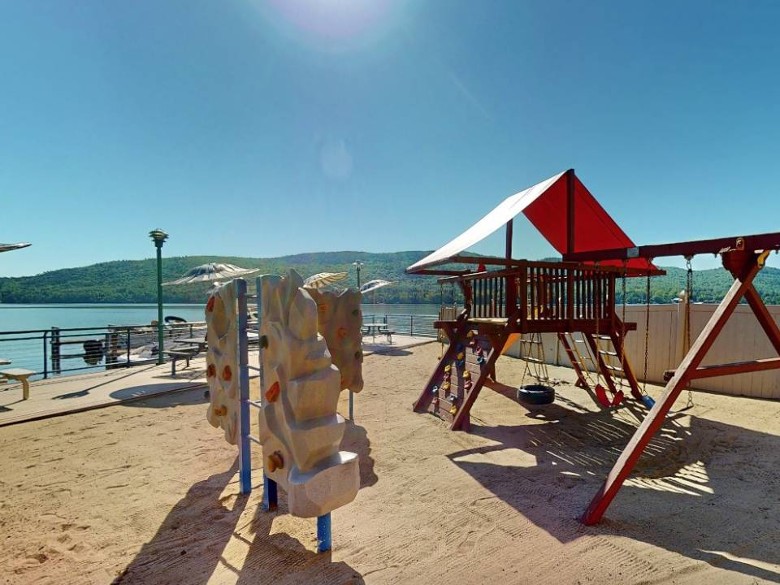 a playground area by the lake