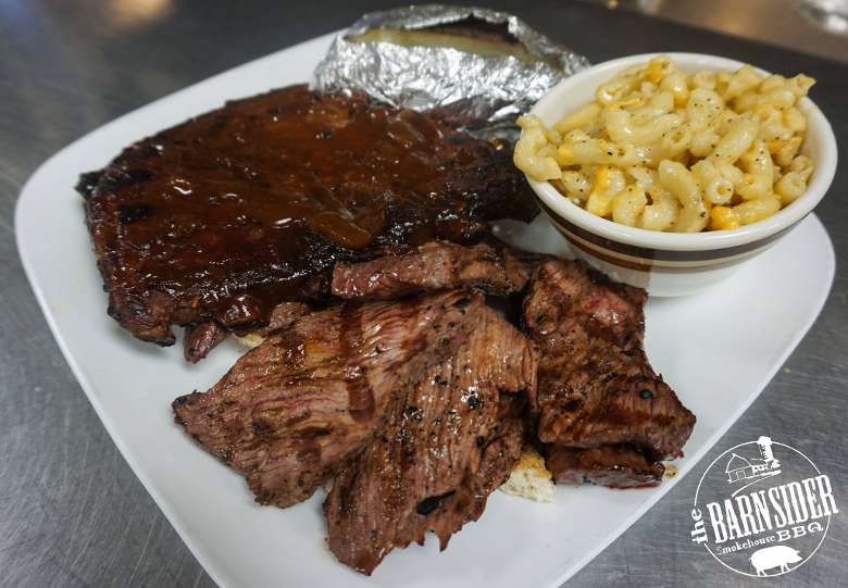plate with brisket, ribs, and mac and cheese