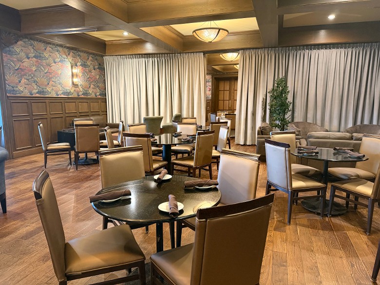 tables and chairs set up in a restaurants