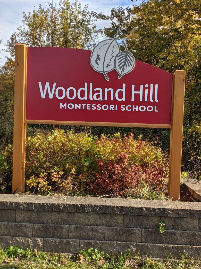 woodland hill montessori school sign