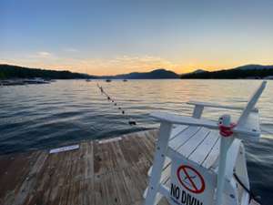 lifeguard chair on dock by water