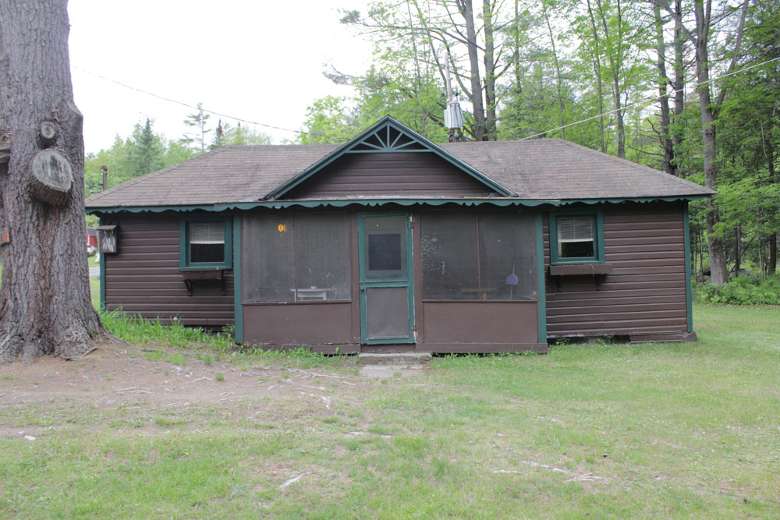 one story dark brown cabin