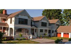 exterior of the springwater bed and breakfast, a large house with an attached garage