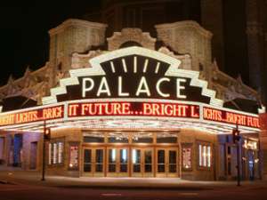 front marquis of the palace theater at night