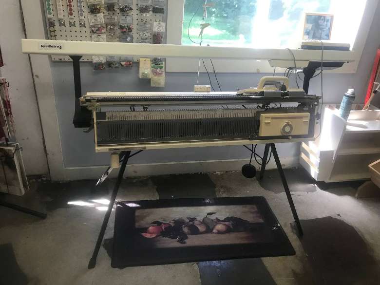 a large knitting machine in a store