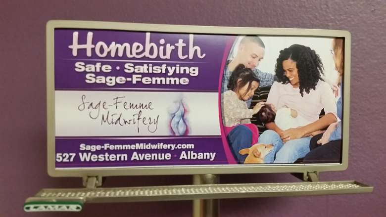 miniature sage-femme midwifery billboard