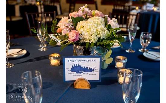 Table with bouquet and Big Burnt Island sign