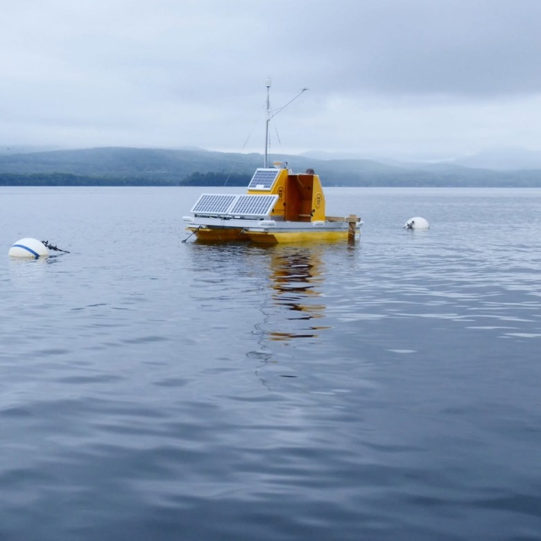the Jefferson Project yellow floating boat on Lake George