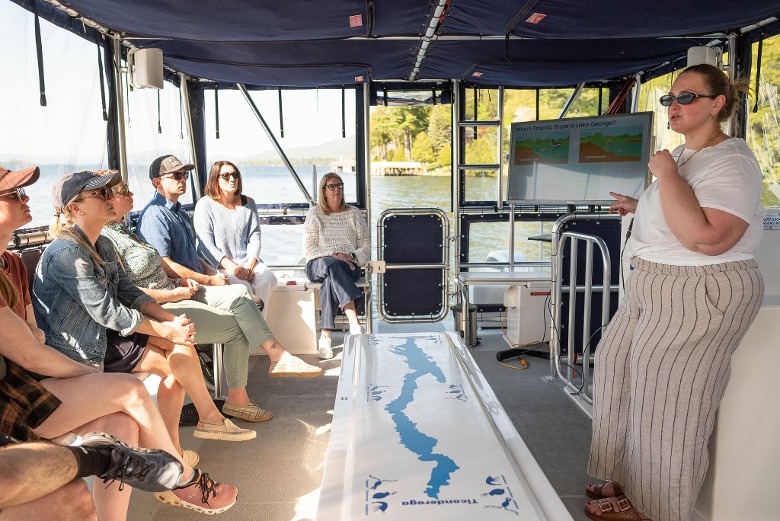 group inside the Lake George Association floating classroom