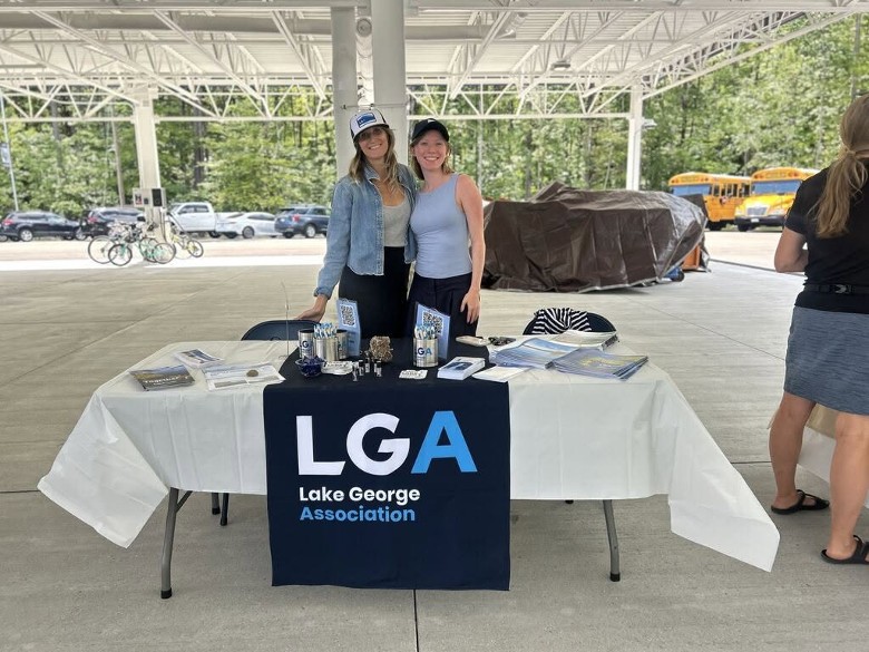 two women at a Lake George Association table
