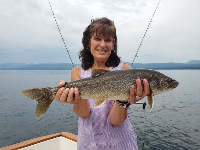 woman holding fish