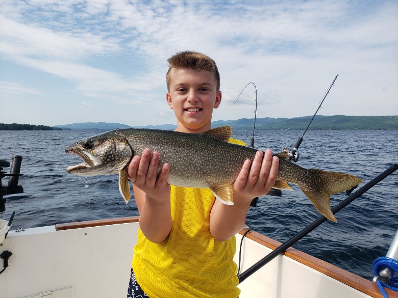 child holding fish