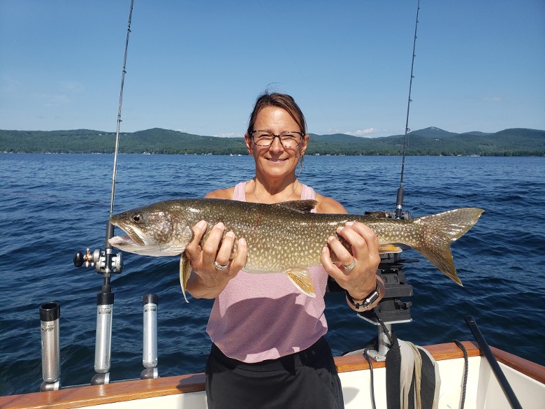 woman holding fish