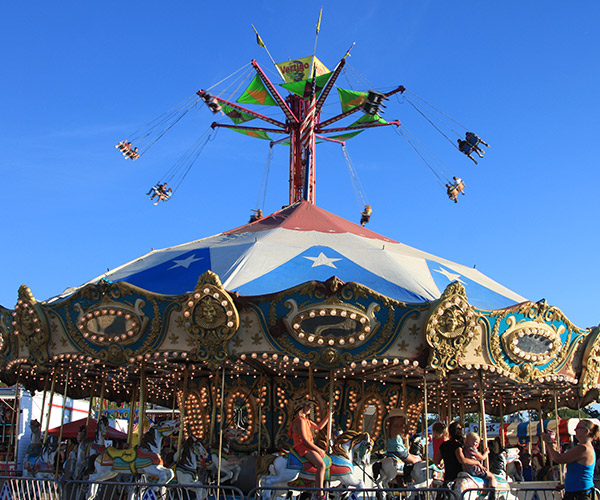 fair rides with blue sky