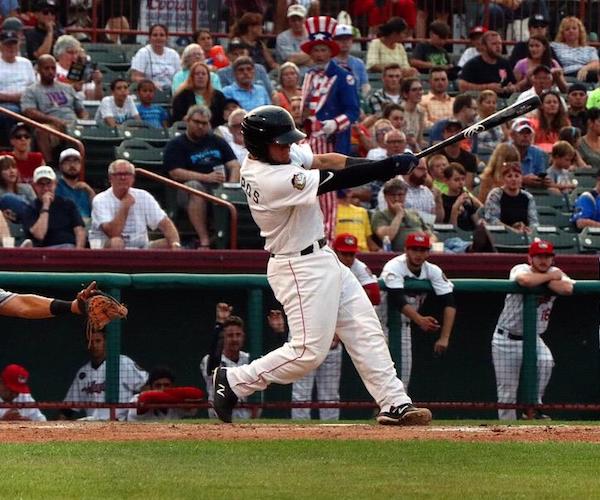 baseball player swinging