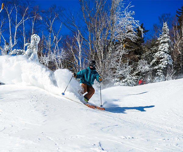 person skiing at gore