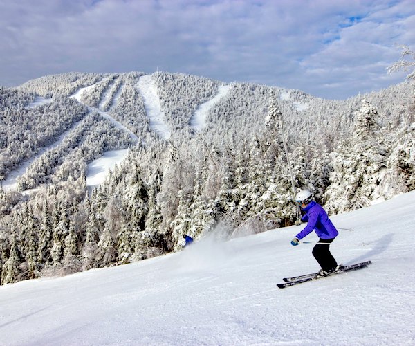 person skiing down Gore Mountain