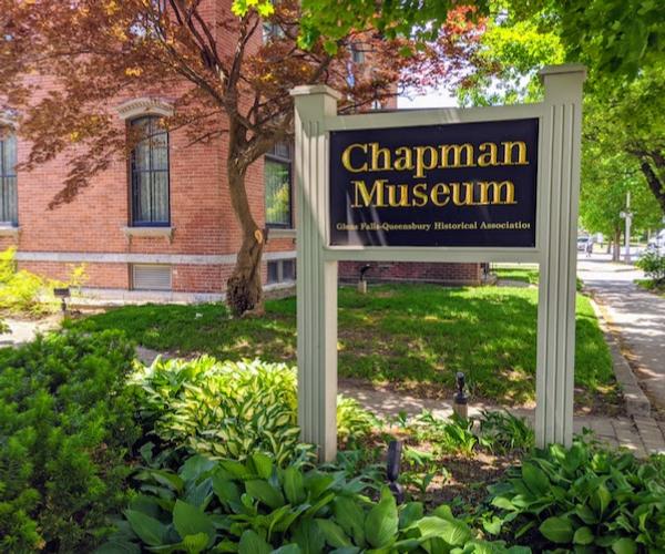 sign for the Chapman Museum in front of Chapman Museum building