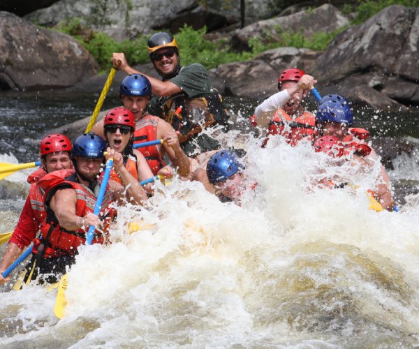 people on a whitewater rafting trip