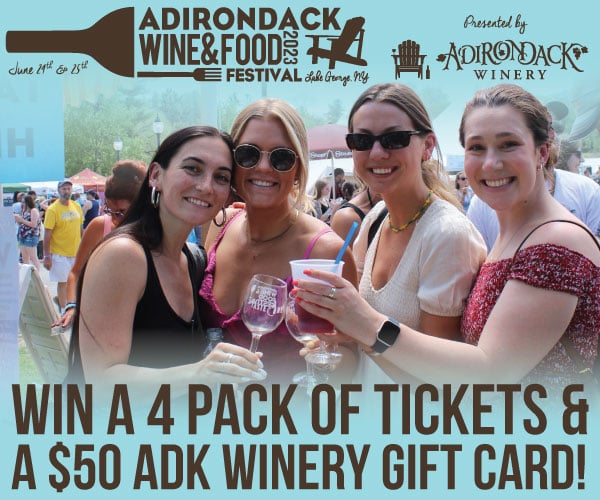 four women cheersing at the adirondack wine and food festival, wine a 4 pack of tickets & a $50 ADK Winery gift card