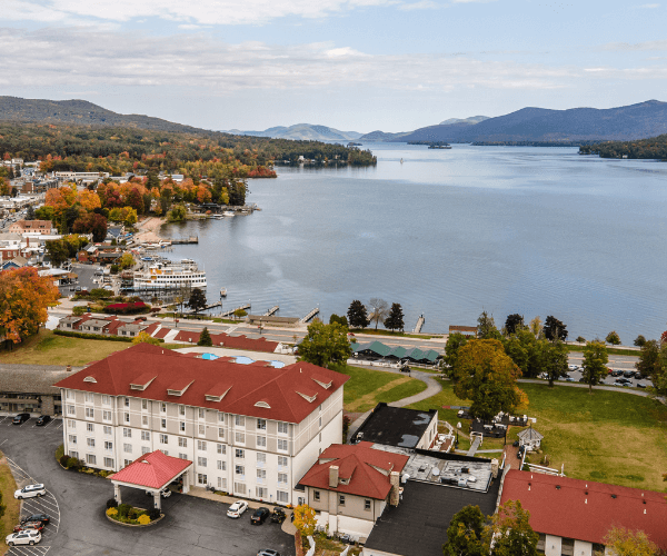 Aerial view of Fort William Henry Hotel and Lake George in the Fall
