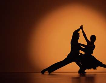 silhouette of couple dancing