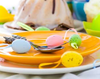 stock photo easter plate with small colored eggs