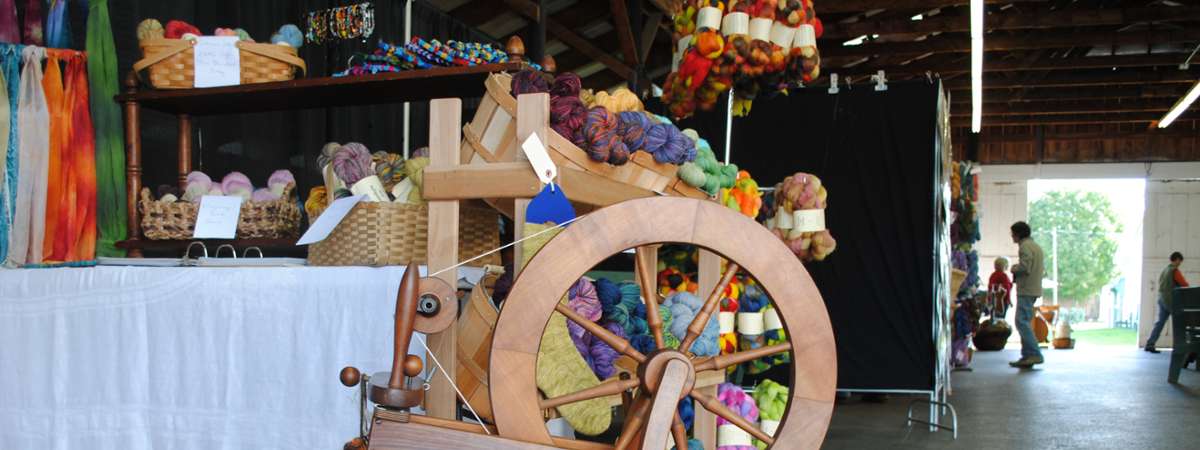 spinning wheel and colored yarn