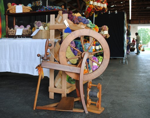 spinning wheel and colored yarn