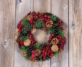 holiday wreath decorated with pinecones