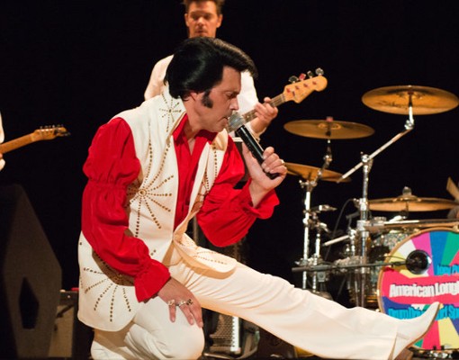 elvis impersonator james cawley on stage