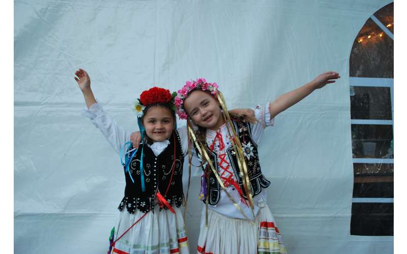 two girls dressed in polish clothing