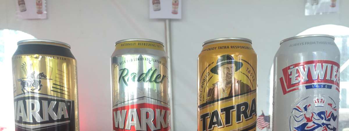 four polish drinks in cans