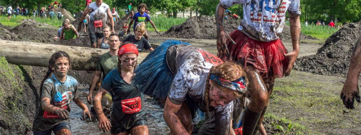 runners in mud