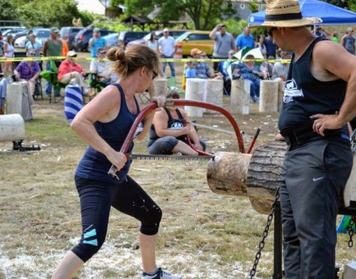 woman sawing lumber