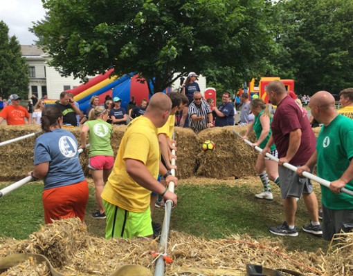 what looks like people playing tug of war