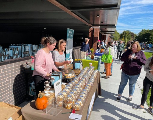 vendors outside selling cakes