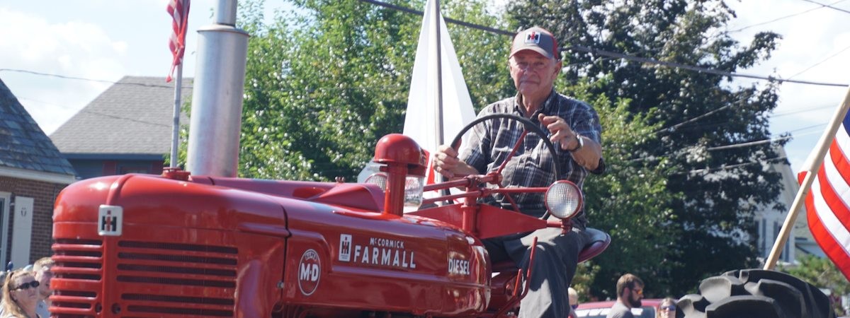 man on tractor