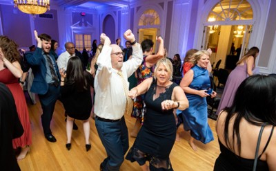 People dacingon dance floor at Party