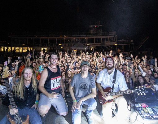 band members in front of crowd