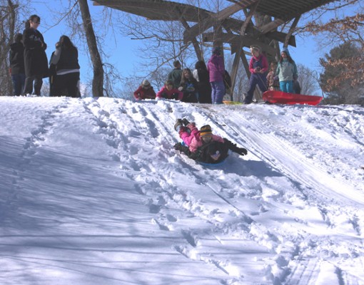 sledding down a hill
