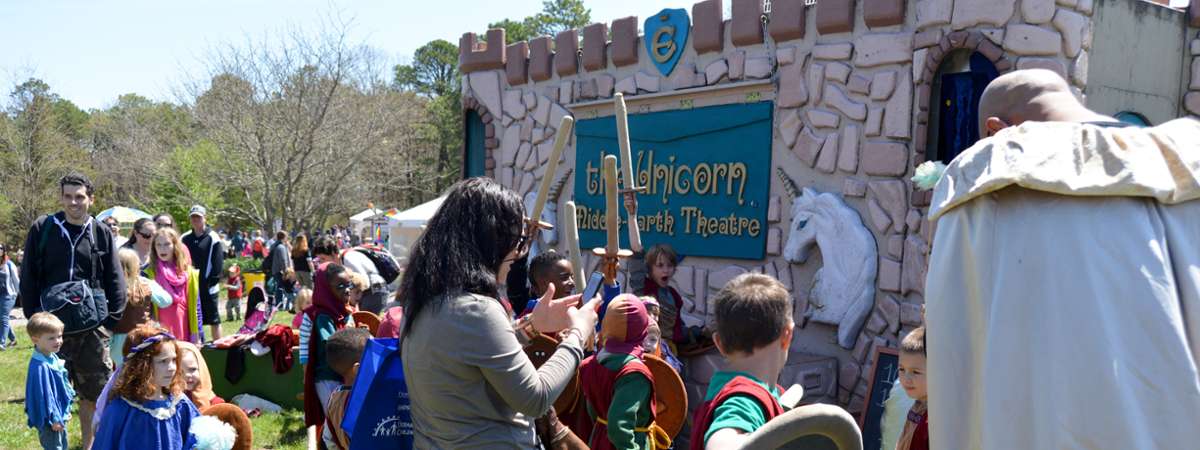 kids outside a play theatre castke