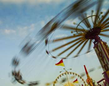 spinning amusement park ride at a county fair
