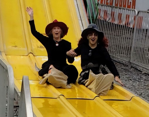 two people sliding