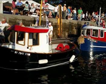 two tugboats in the water