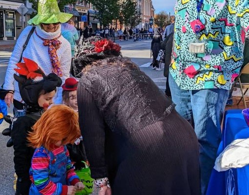 costumed kids trick or treating at boo 2 you