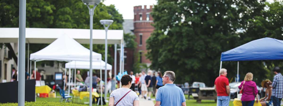 people walking on the grounds at the hyde