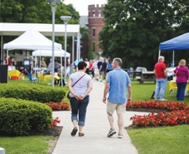 people walking on the grounds at the hyde